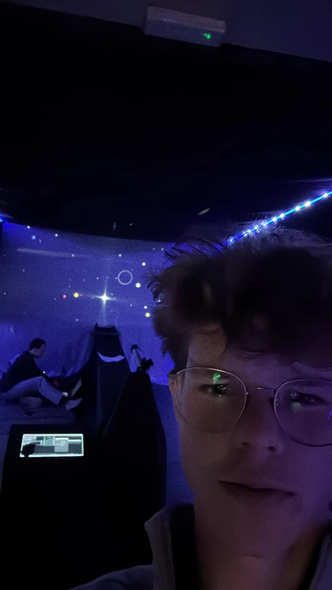 The Exoplanet Explorer installation: a telescope aimed at a projected night sky